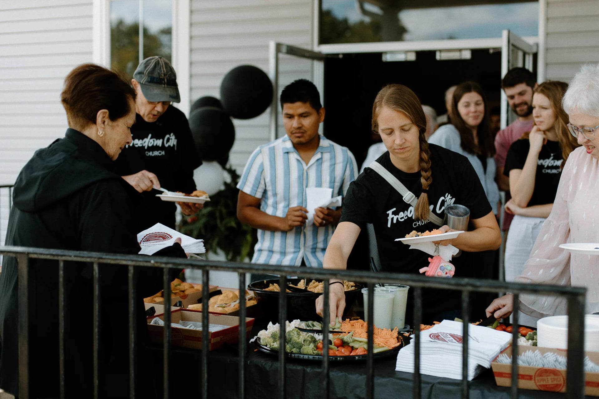 Freedom City serving at a community cookout