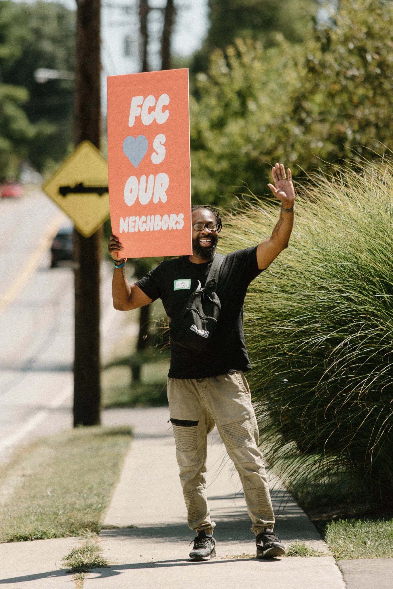 An FCC loves our neighbors sign