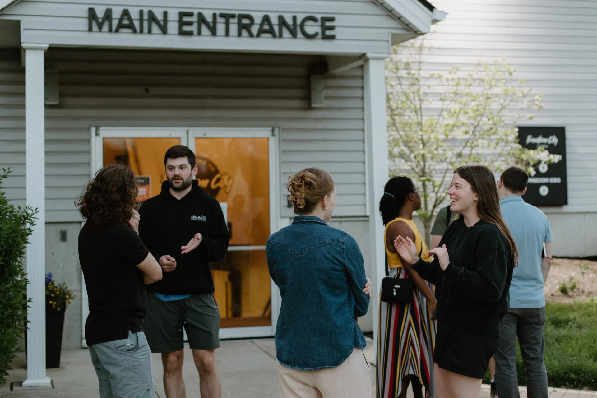 People connecting after a Sunday gathering
